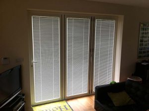 Blinds covering doors