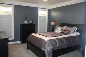 Dark blue themed bedroom