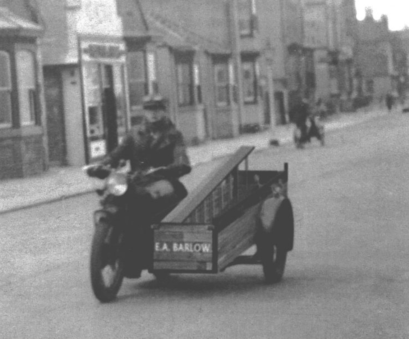 man driving a bike with a side kart