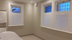 window shutters in bathrooms cafe style in white