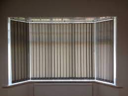 vertical blinds in a 3 panel bay window